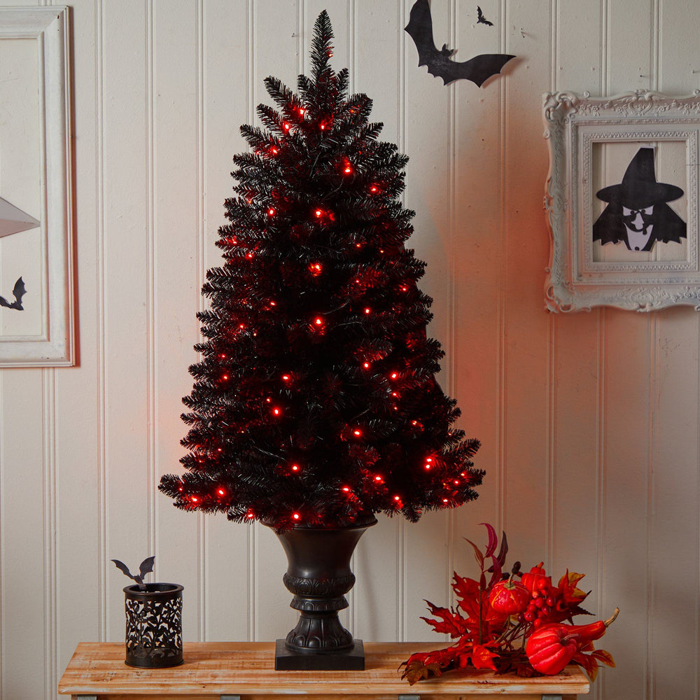 
                      
                        4’ Black Halloween Artificial Christmas Tree in Urn with 100 Orange LED Lights
                      
                    