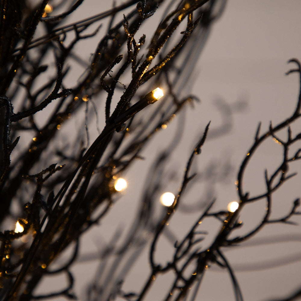 
                      
                        5’ Pre-Lit Halloween Black Twig Artificial Fall Tree in Burlap Planter with 85 Warm White LED Lights
                      
                    