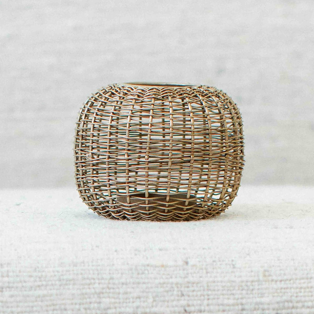 
                      
                        texxture Ashbury™ Woven Iron Candle Holder - lily & onyx
                      
                    