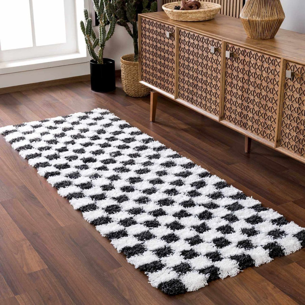 
                      
                        Hauteloom Atira Black & White Checkered Area Rug - lily & onyx
                      
                    