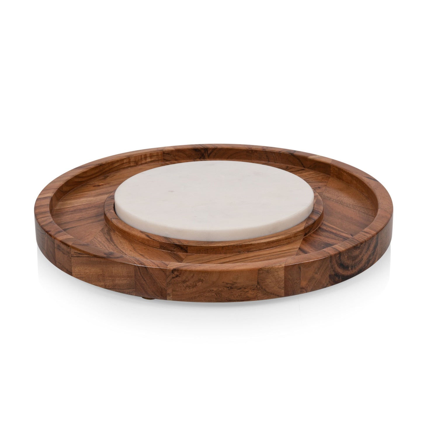 A two-in-one wood and marble serving tray where the marble cheeseboard insert is placed on top of the wooden base.