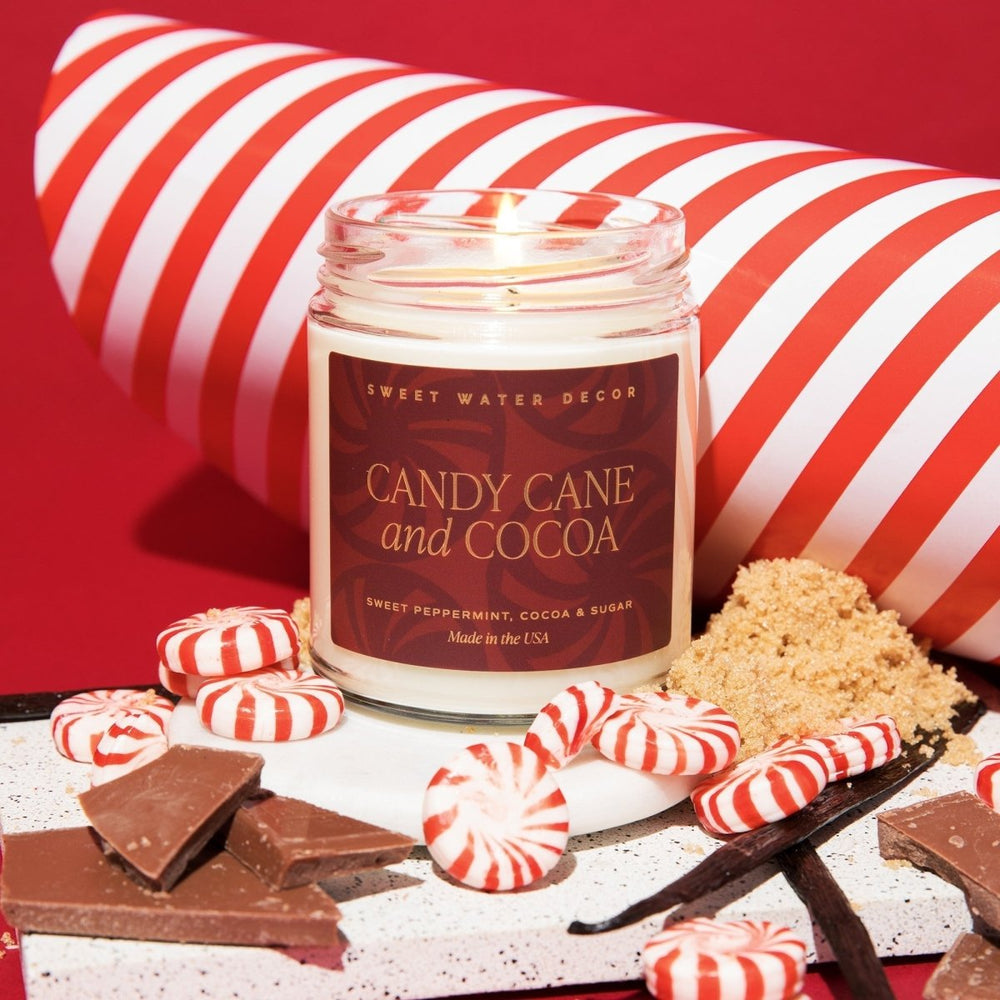 
                      
                        Sweet Water Decor Candy Cane and Cocoa Soy Candle - Clear Jar - 9 oz - lily & onyx
                      
                    