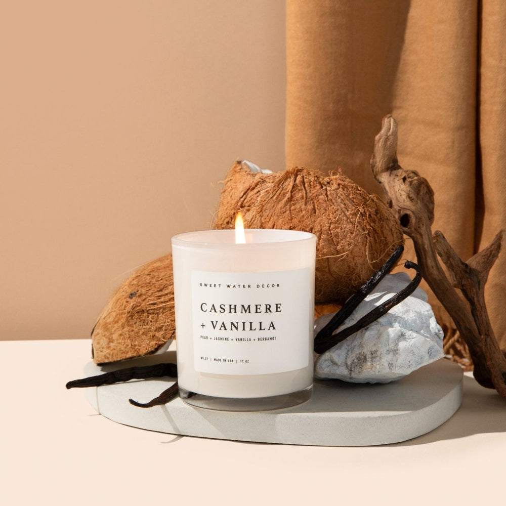 
                      
                        Sweet Water Decor Cashmere and Vanilla Soy Candle - White Jar - 11 oz - lily & onyx
                      
                    