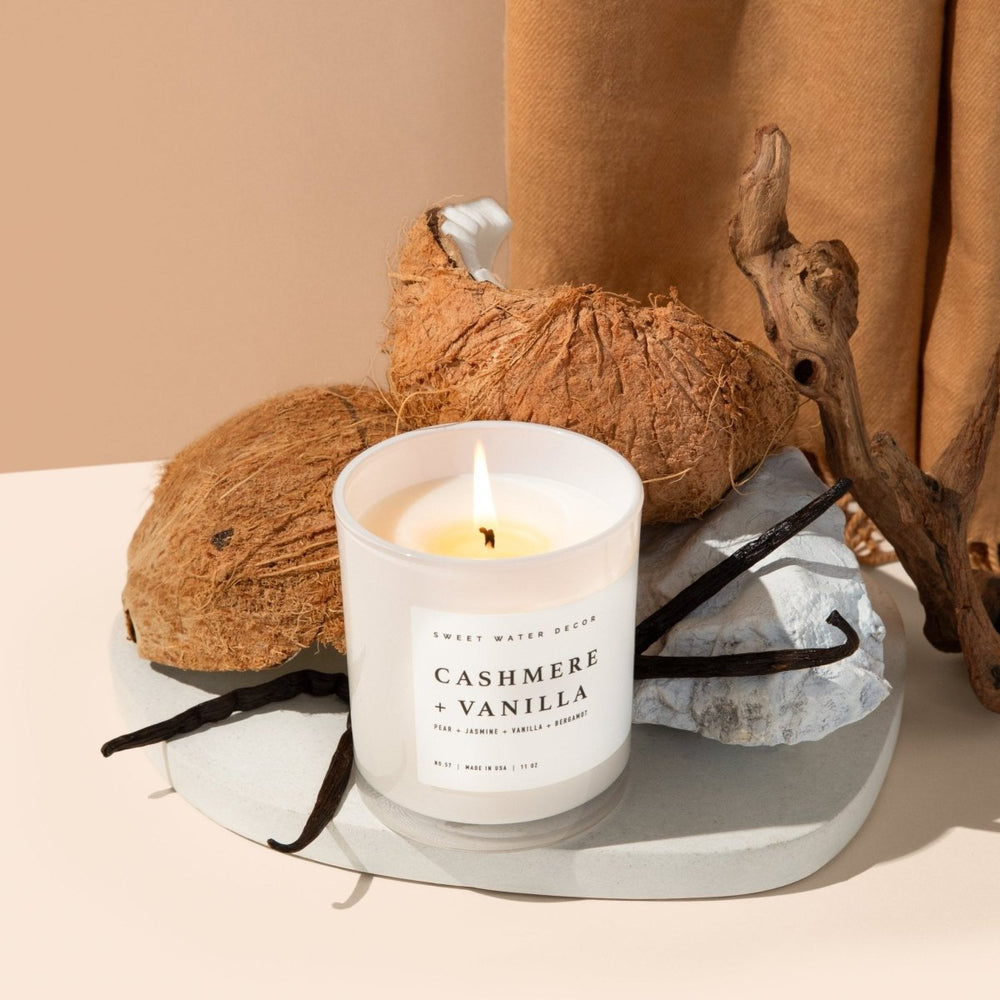 
                      
                        Sweet Water Decor Cashmere and Vanilla Soy Candle - White Jar - 11 oz - lily & onyx
                      
                    