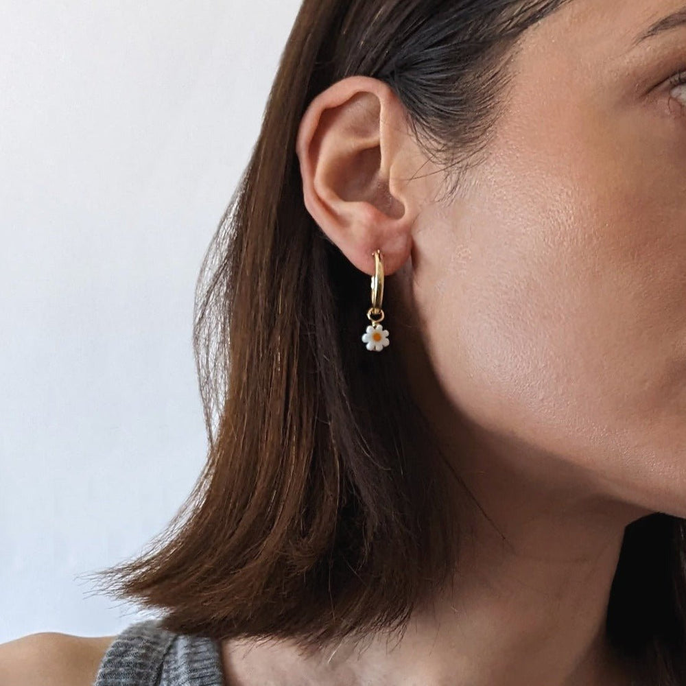 
                      
                        Pretti.Cool Charm Hoop Earrings | Daisies - lily & onyx
                      
                    