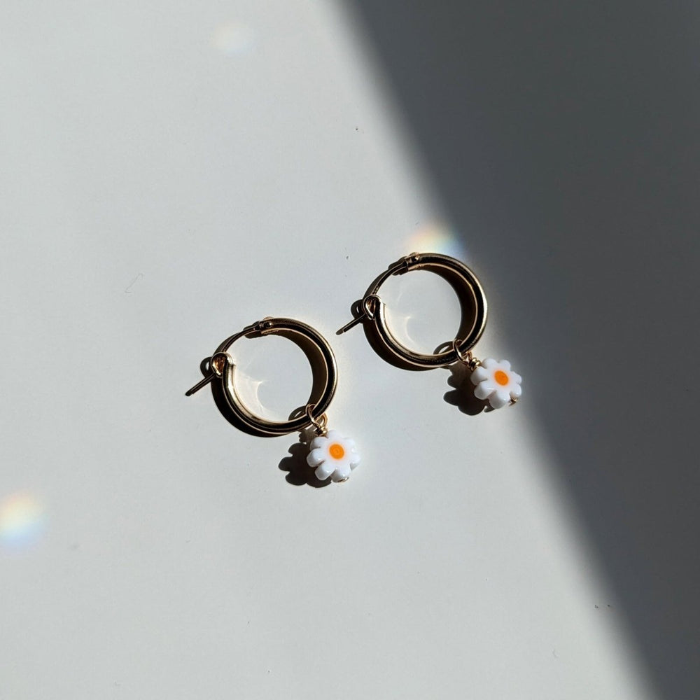 
                      
                        Pretti.Cool Charm Hoop Earrings | Daisies - lily & onyx
                      
                    