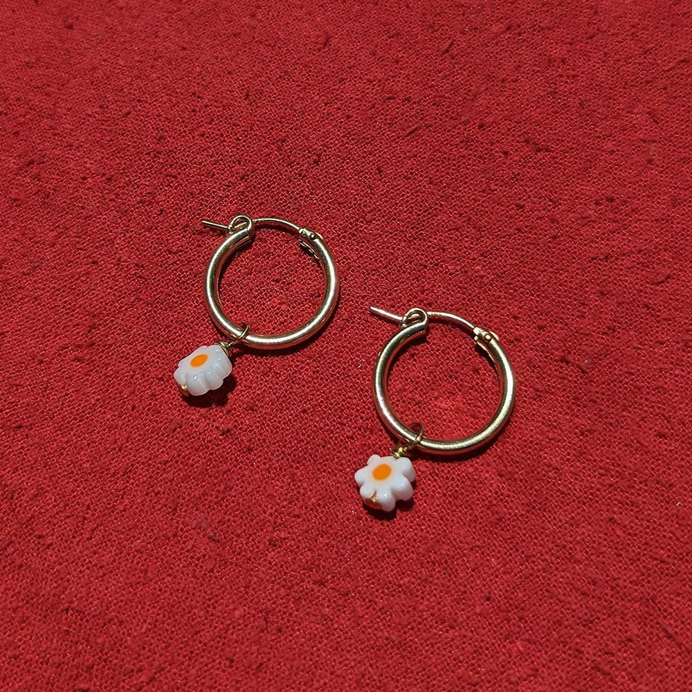 
                      
                        Pretti.Cool Charm Hoop Earrings | Daisies - lily & onyx
                      
                    