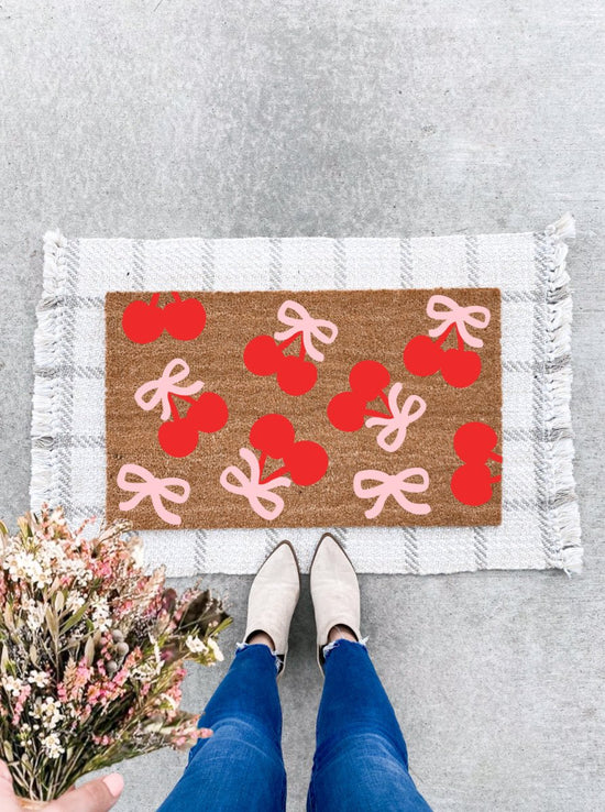 The Doormat Co. Cherries + Bows Doormat - lily & onyx
