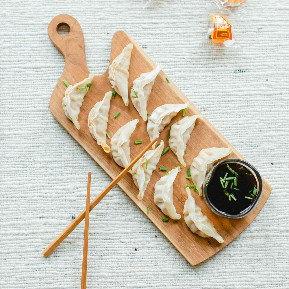 texxture Chiku™ Carved Teak Handled Cutting & Serving Board - lily & onyx