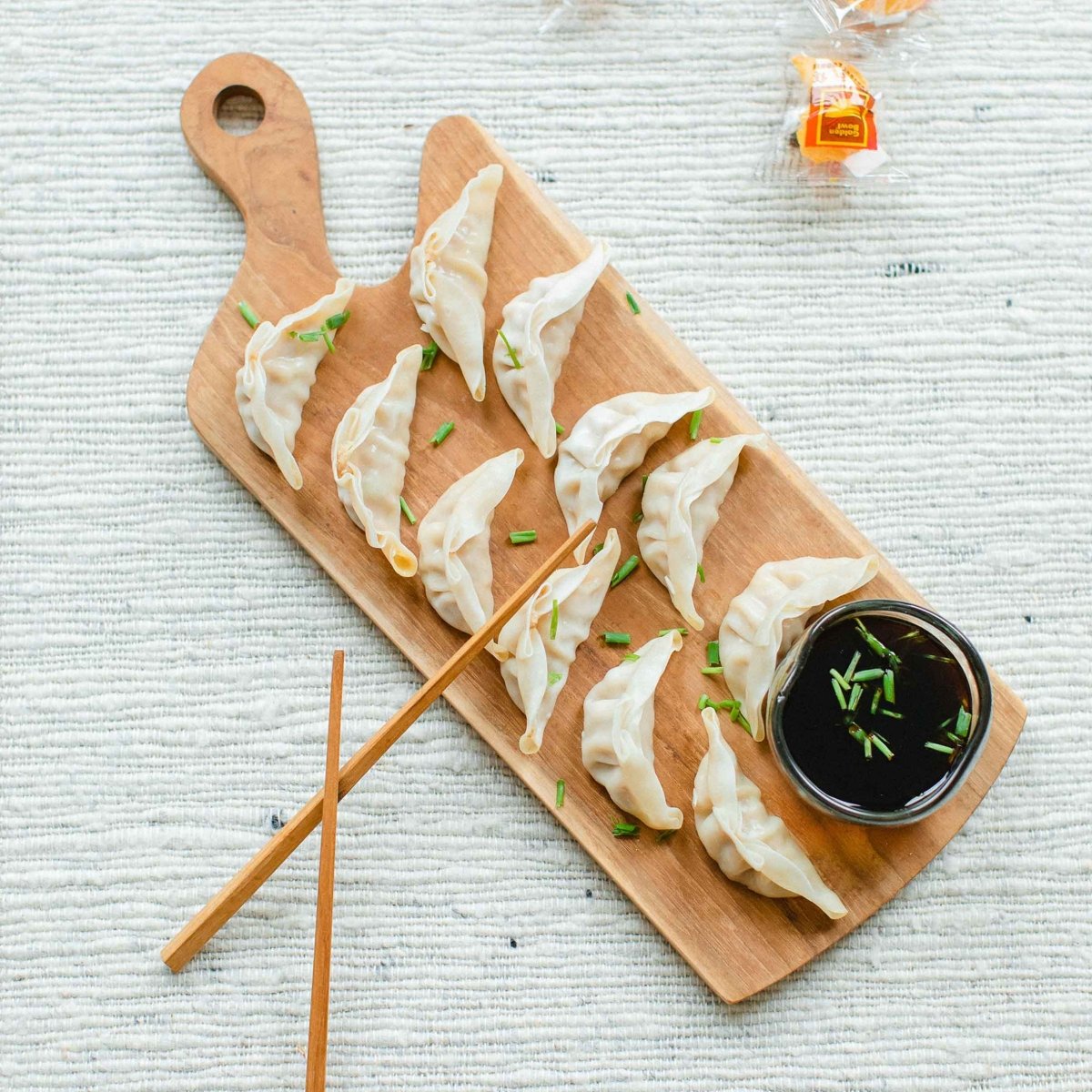 texxture Chiku™ Carved Teak Handled Cutting & Serving Board - lily & onyx