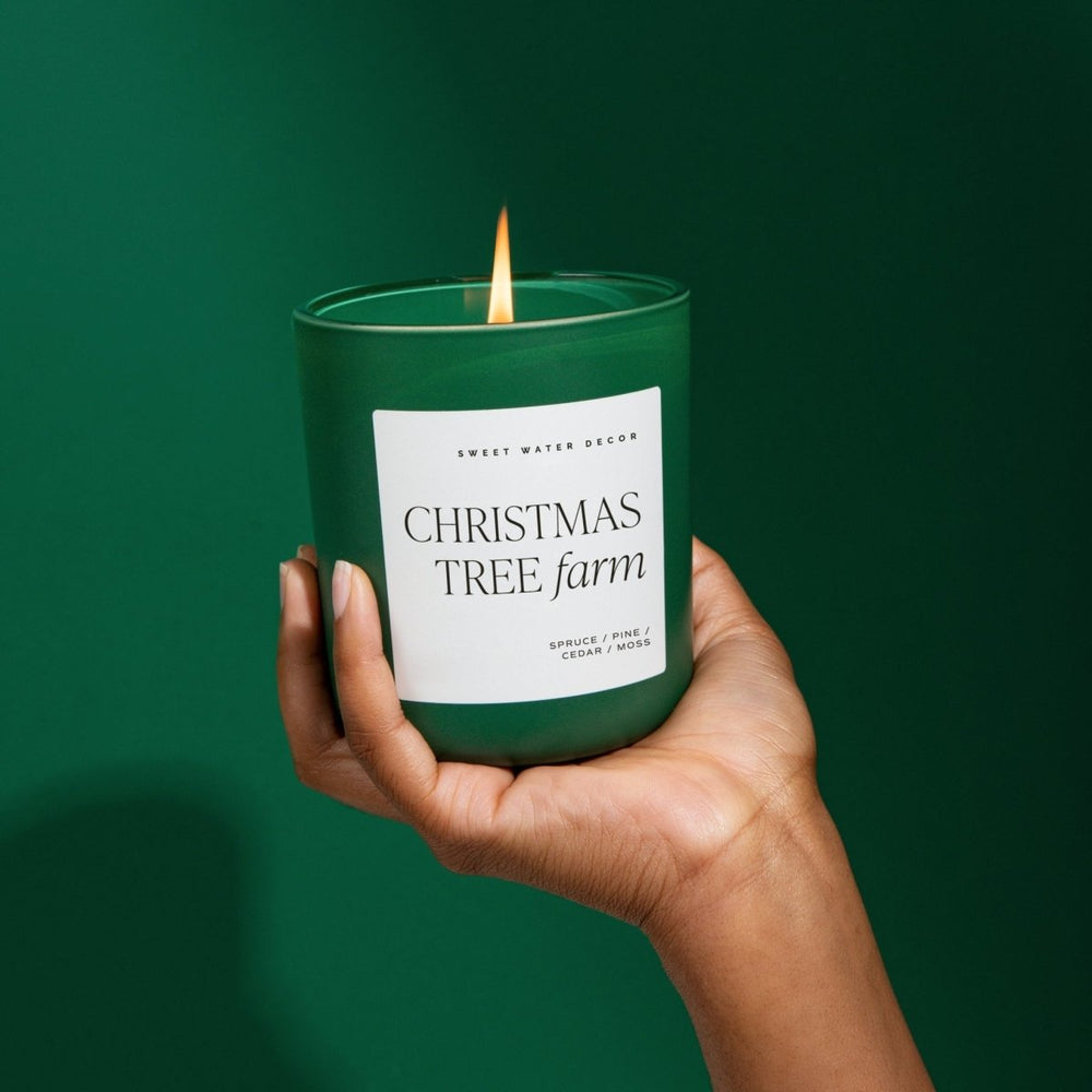 
                      
                        Sweet Water Decor Christmas Tree Farm Soy Candle - Green Matte Jar - 15 oz - lily & onyx
                      
                    