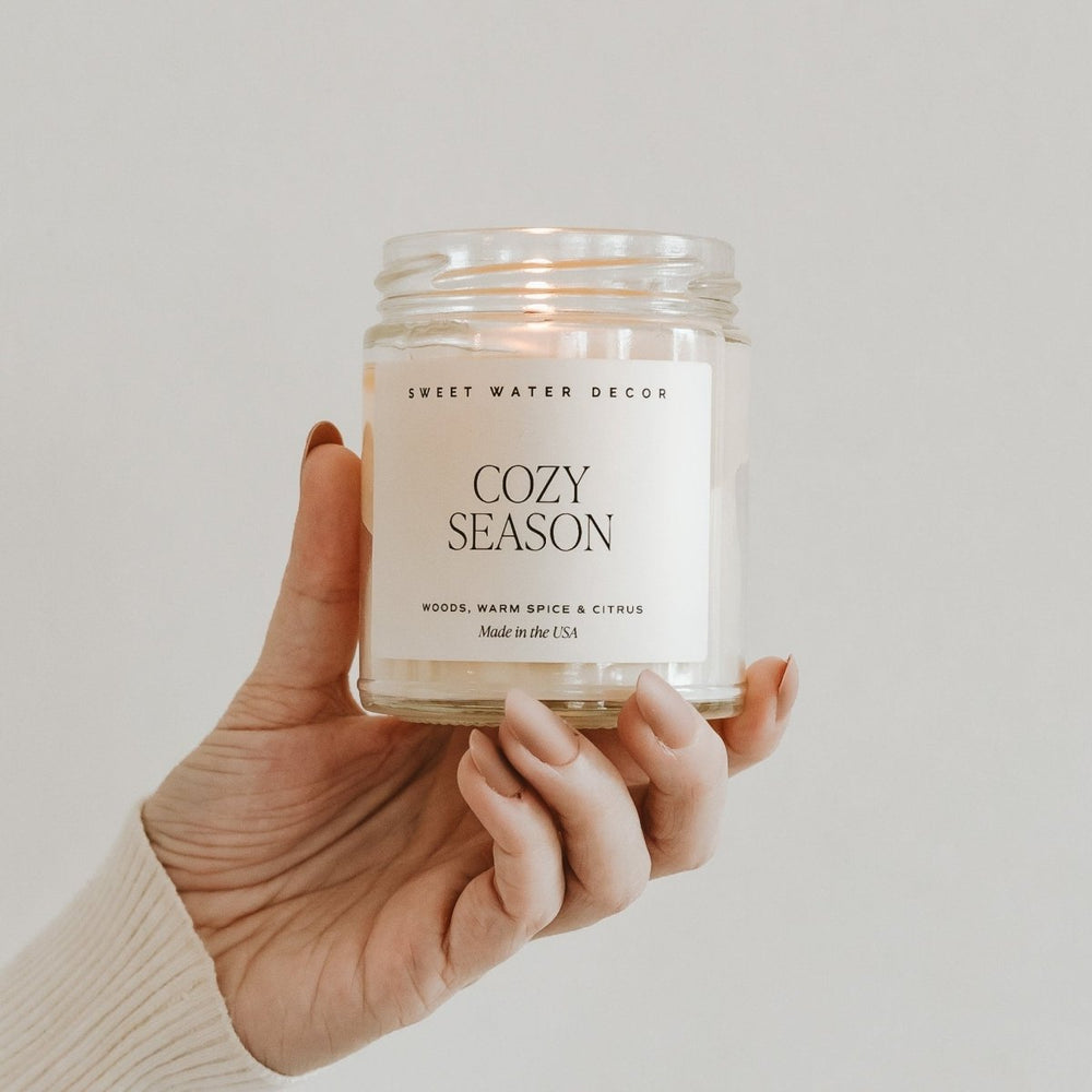 
                      
                        Sweet Water Decor Cozy Season Soy Candle - Clear Jar - 9 oz - lily & onyx
                      
                    