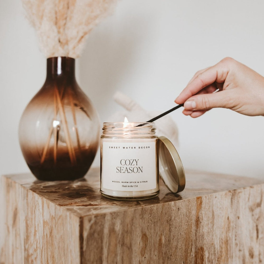 
                      
                        Sweet Water Decor Cozy Season Soy Candle - Clear Jar - 9 oz - lily & onyx
                      
                    