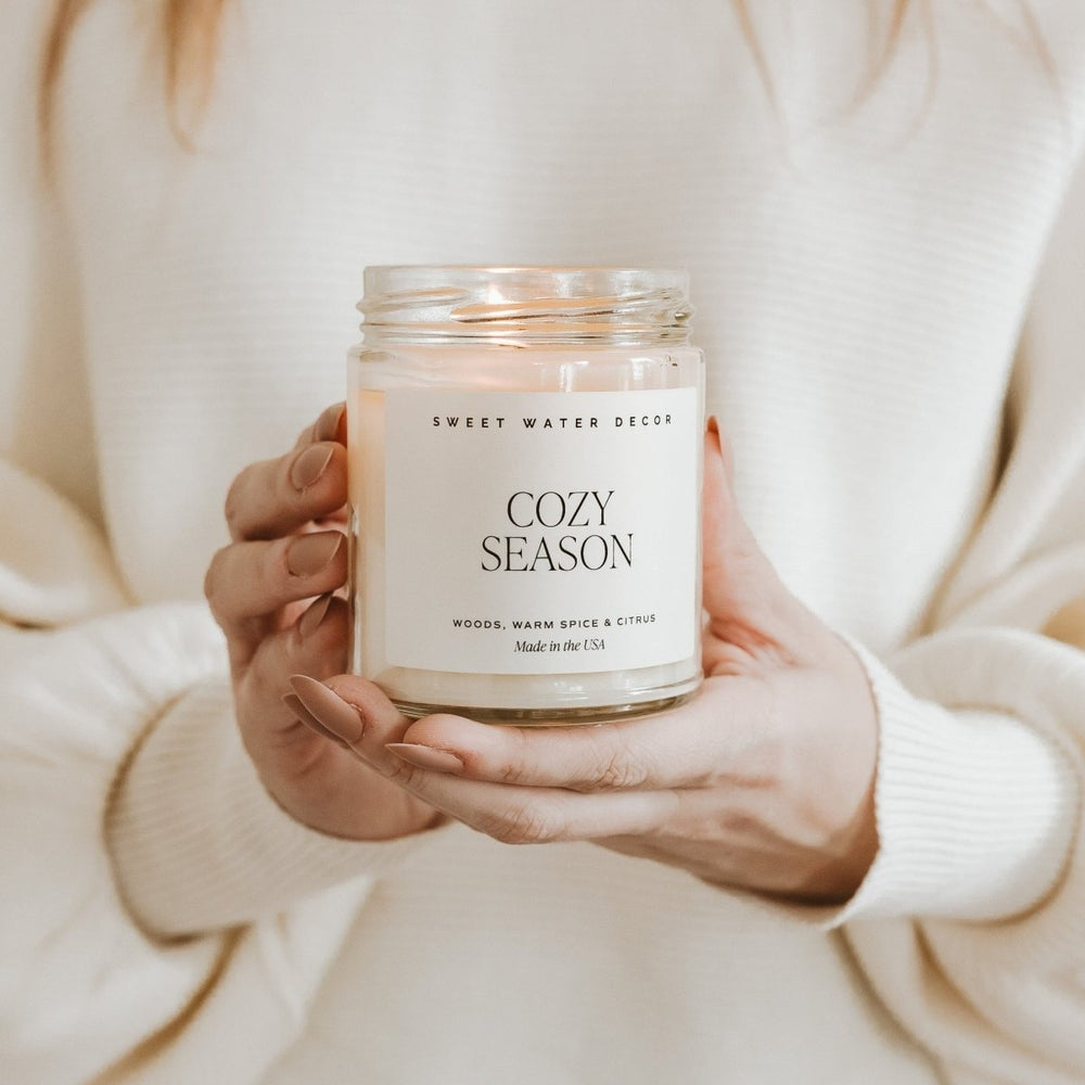 
                      
                        Sweet Water Decor Cozy Season Soy Candle - Clear Jar - 9 oz - lily & onyx
                      
                    