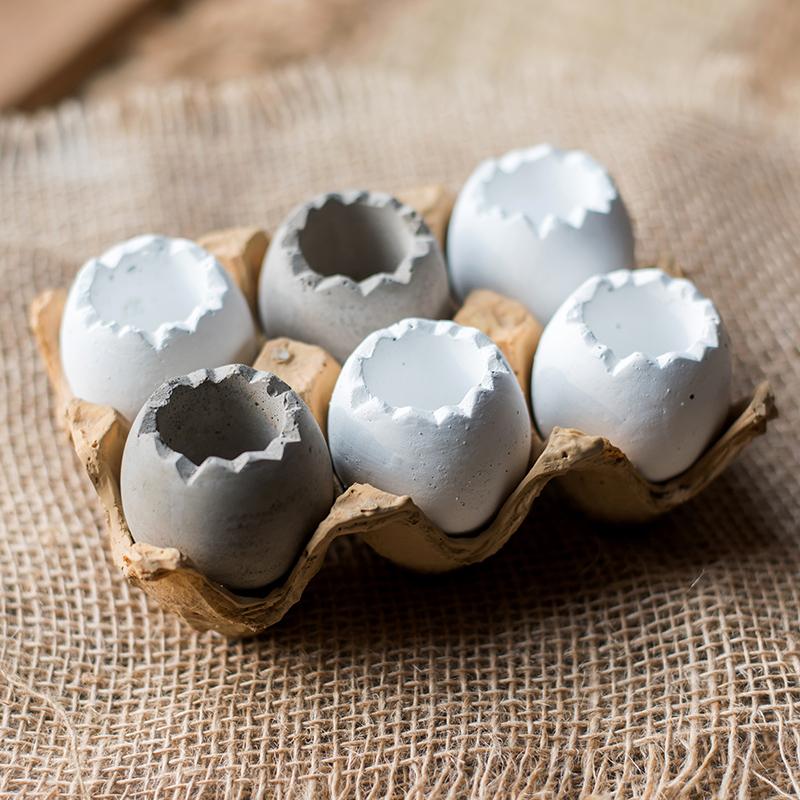 
                      
                        Decorative Eggshell Style Cement Planter
                      
                    