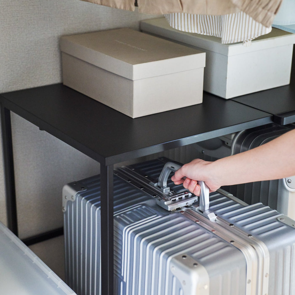 
                      
                        Expandable Steel Suitcase Rack
                      
                    
