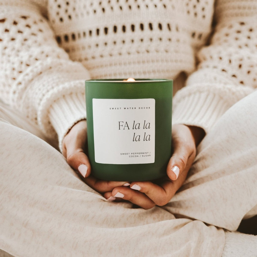 Sweet Water Decor Fa La La La La Soy Candle - Green Matte Jar - 15 oz (Hot Cocoa and Peppermint) - lily & onyx