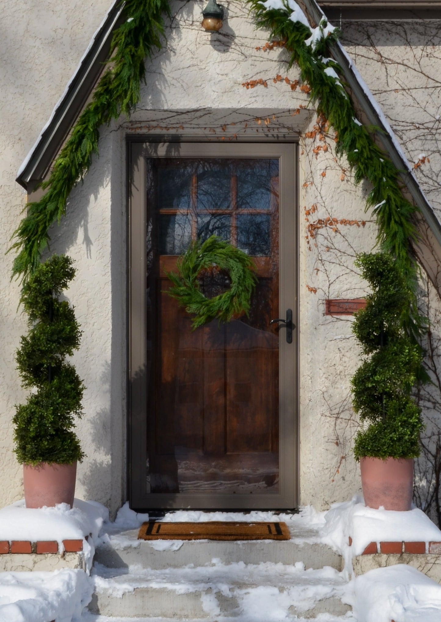 21" UV Treated Faux Indoor/Covered Outdoor Cedar Wreath