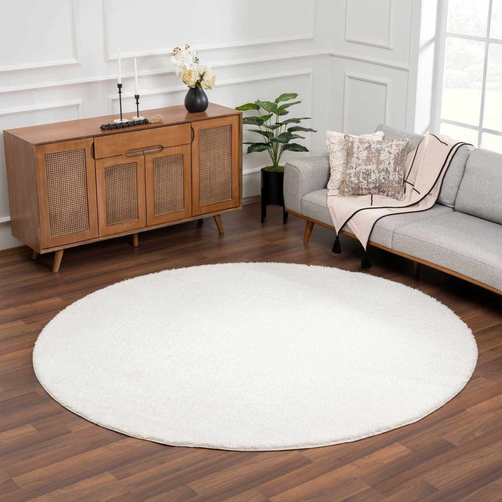 
                      
                        Hauteloom Heavenly Solid Cream Plush Rug - lily & onyx
                      
                    