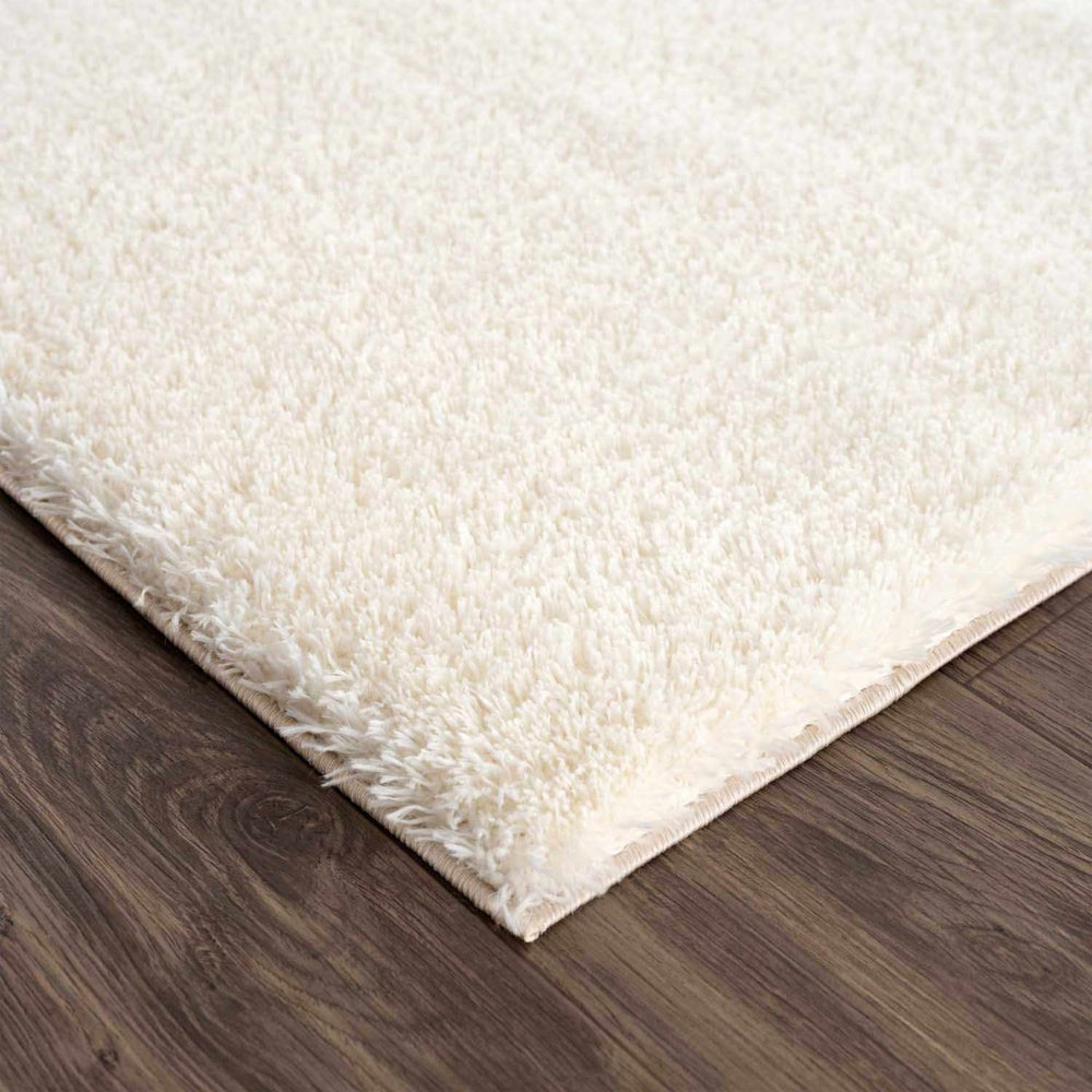 
                      
                        Hauteloom Heavenly Solid Cream Plush Rug - lily & onyx
                      
                    