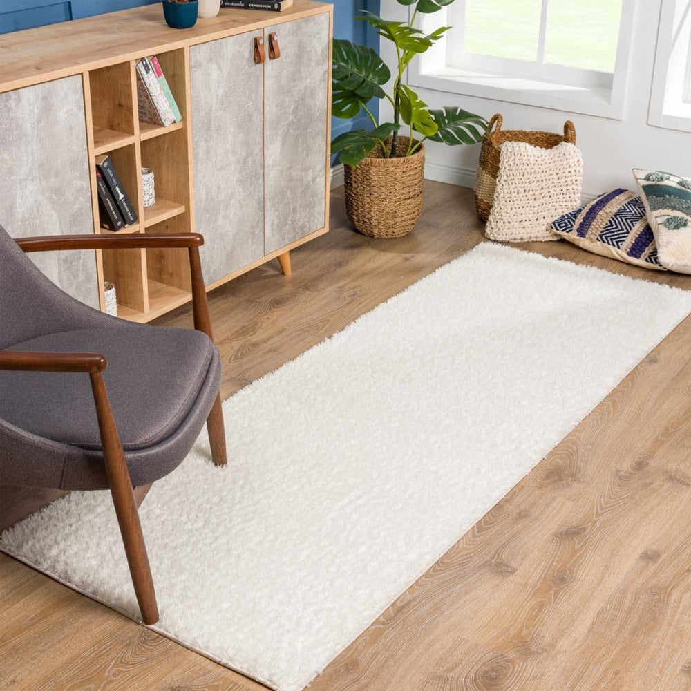 
                      
                        Hauteloom Heavenly Solid Cream Plush Rug - lily & onyx
                      
                    