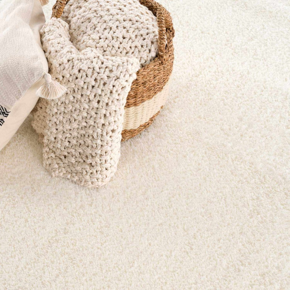 
                      
                        Hauteloom Heavenly Solid Cream Plush Rug - lily & onyx
                      
                    