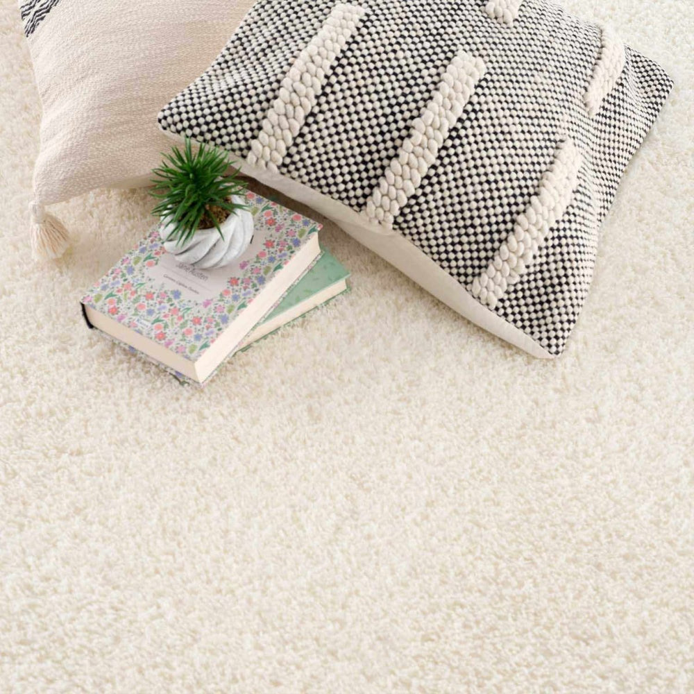 
                      
                        Hauteloom Heavenly Solid Cream Plush Rug - lily & onyx
                      
                    