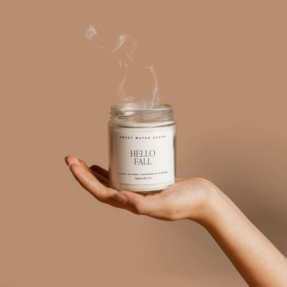 
                      
                        Sweet Water Decor Hello Fall Soy Candle - Clear Jar - 9 oz - lily & onyx
                      
                    