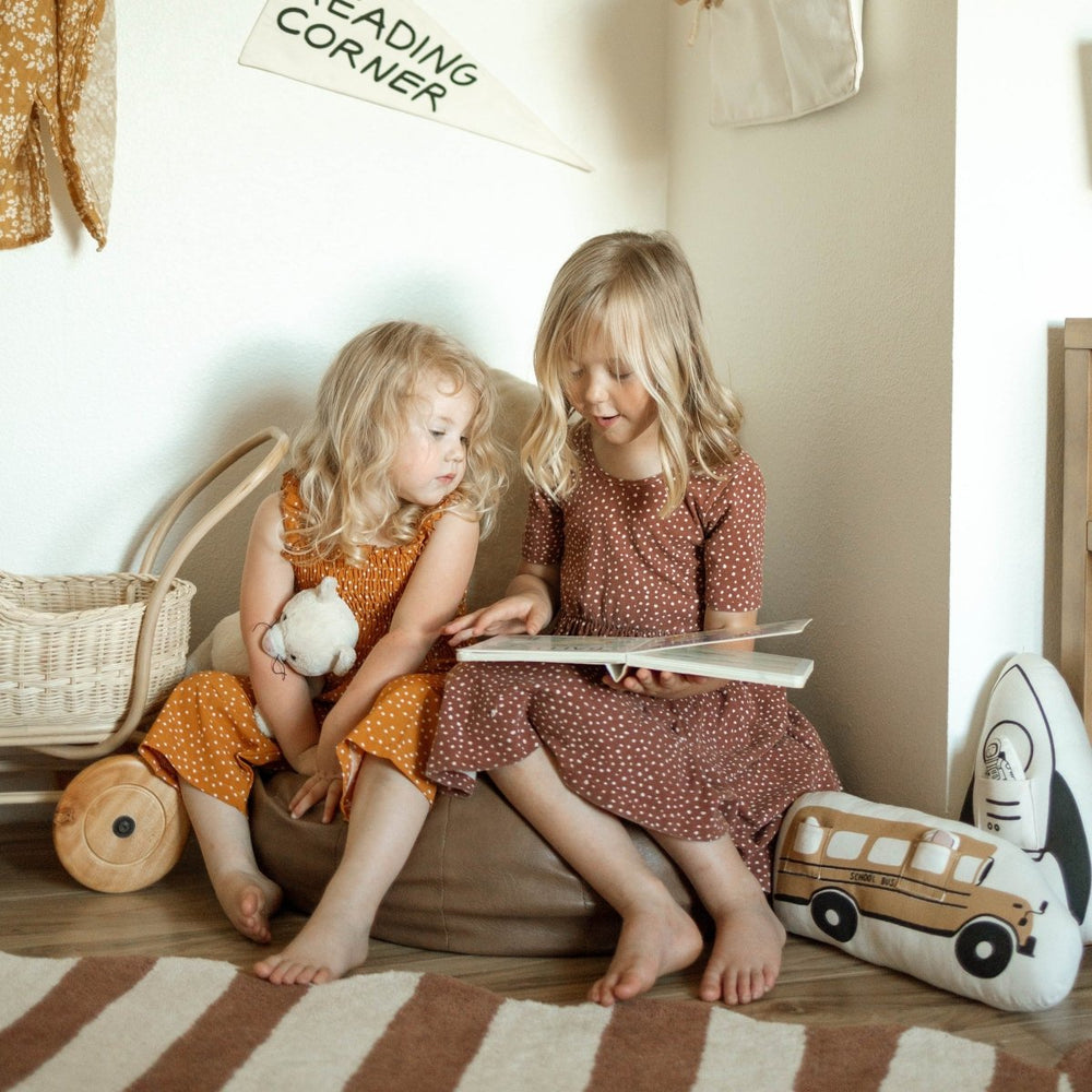 
                      
                        Imani Collective Interactive School Bus Pillow - lily & onyx
                      
                    