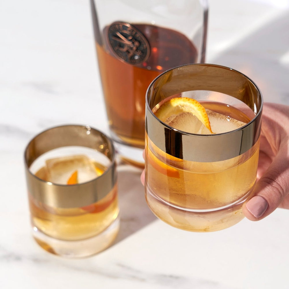 
                      
                        Viski Irving Bronze - Rimmed Crystal Tumblers, Set of 2
                      
                    