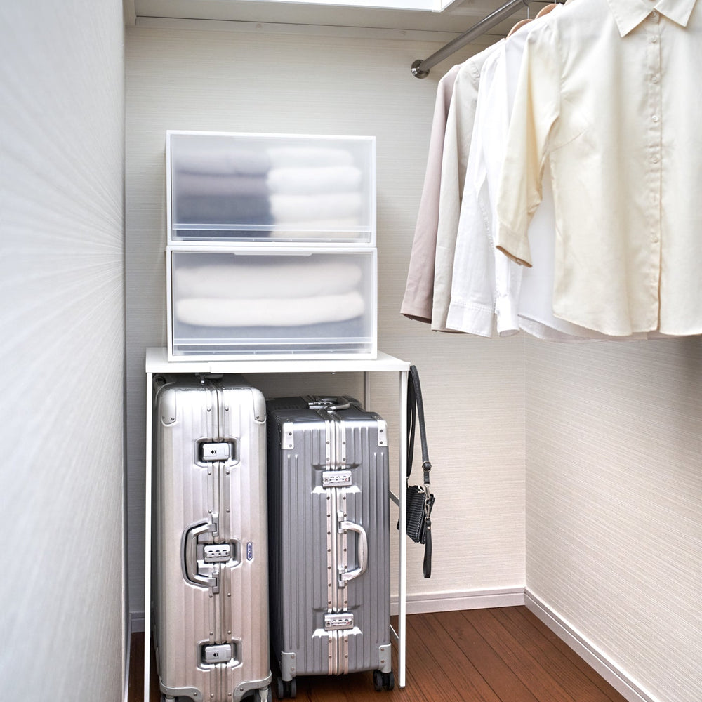
                      
                        Expandable Steel Suitcase Rack
                      
                    