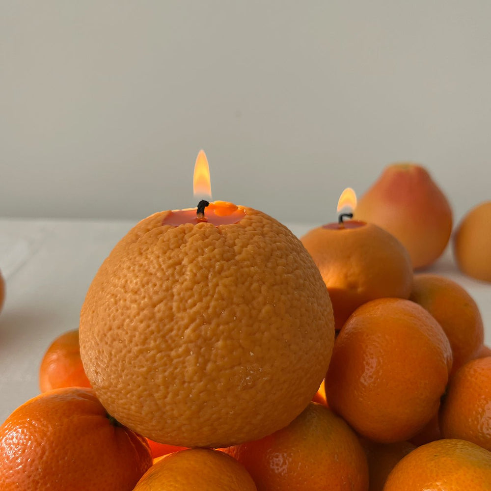 
                      
                        Scandles Large Orange Candle - lily & onyx
                      
                    