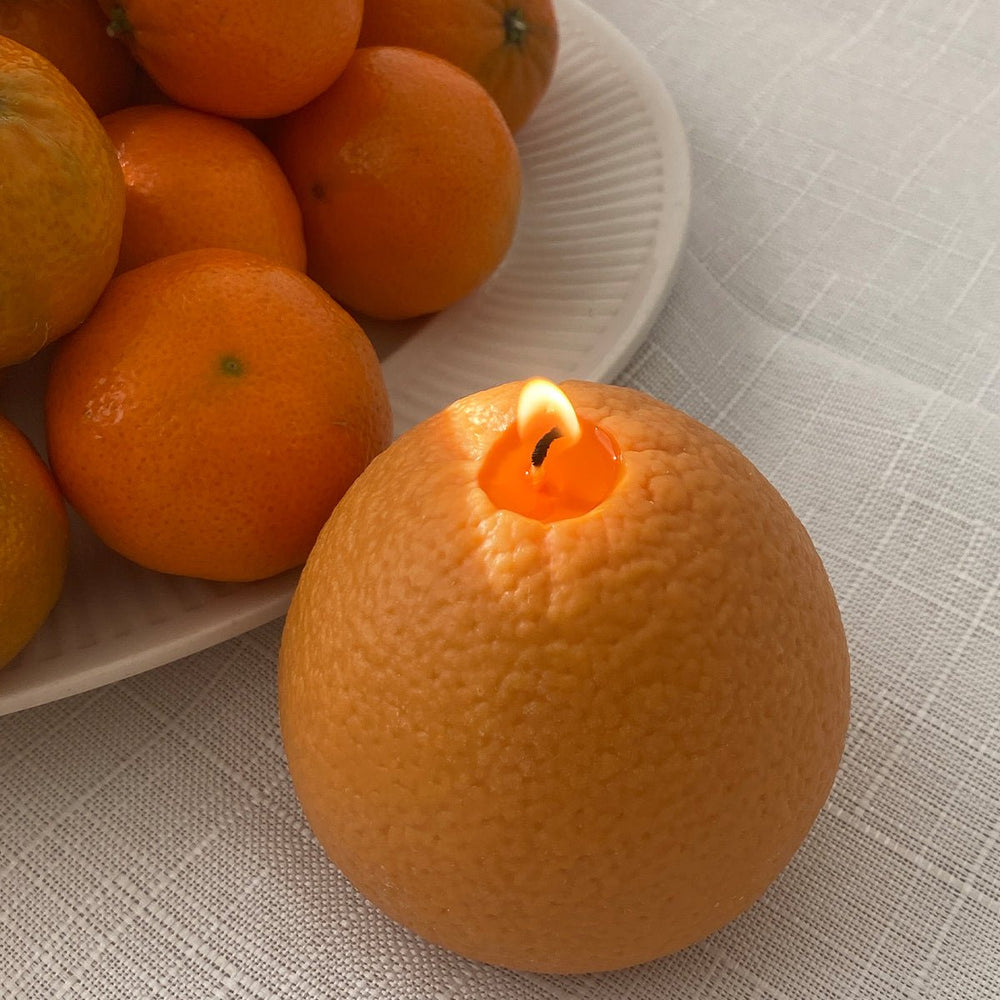 
                      
                        Scandles Large Orange Candle - lily & onyx
                      
                    