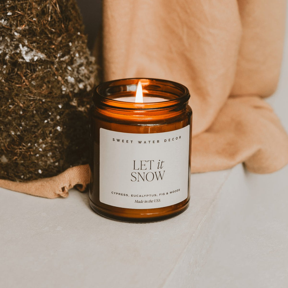 Sweet Water Decor Let It Snow Soy Candle - 9 oz Amber Jar - lily & onyx