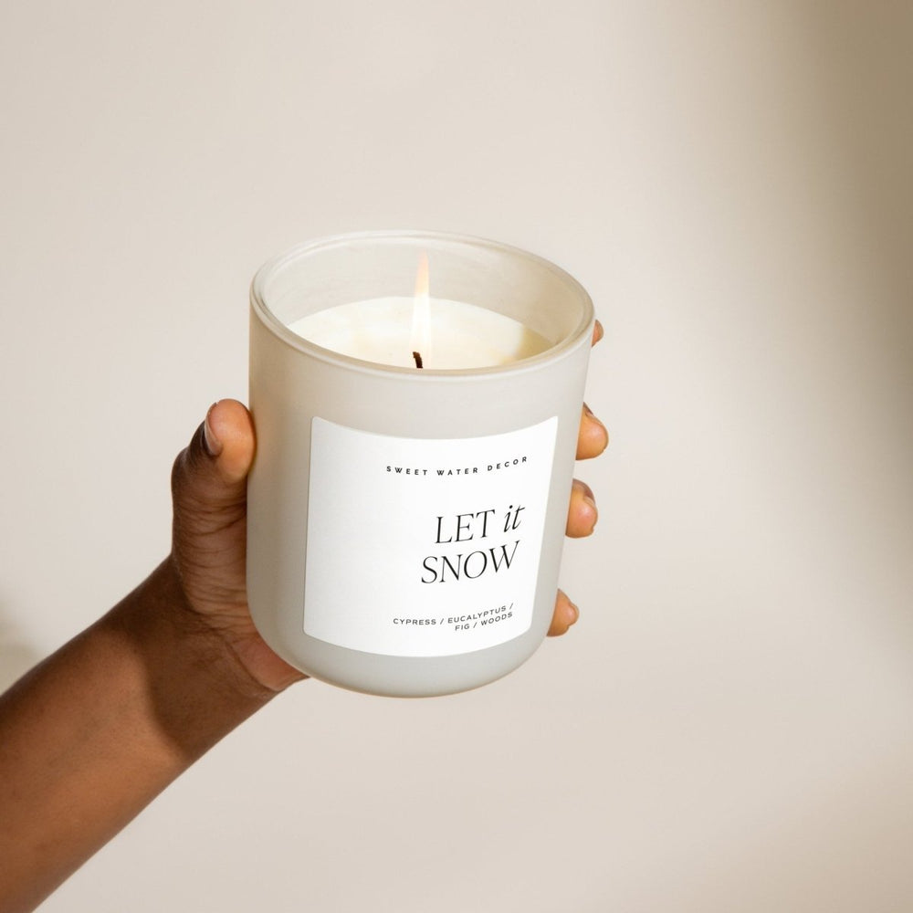 
                      
                        Sweet Water Decor Let It Snow Soy Candle - Tan Matte Jar - 15 oz - lily & onyx
                      
                    