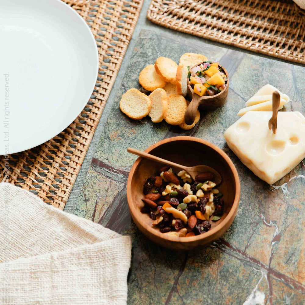 
                      
                        texxture Liana™ Natural Rattan Placemat - lily & onyx
                      
                    
