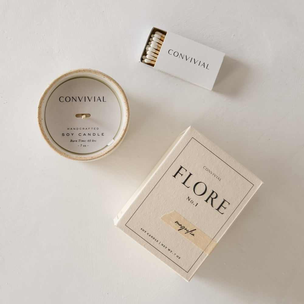 
                      
                        CONVIVIAL Magnolia | 7 oz Candle - lily & onyx
                      
                    