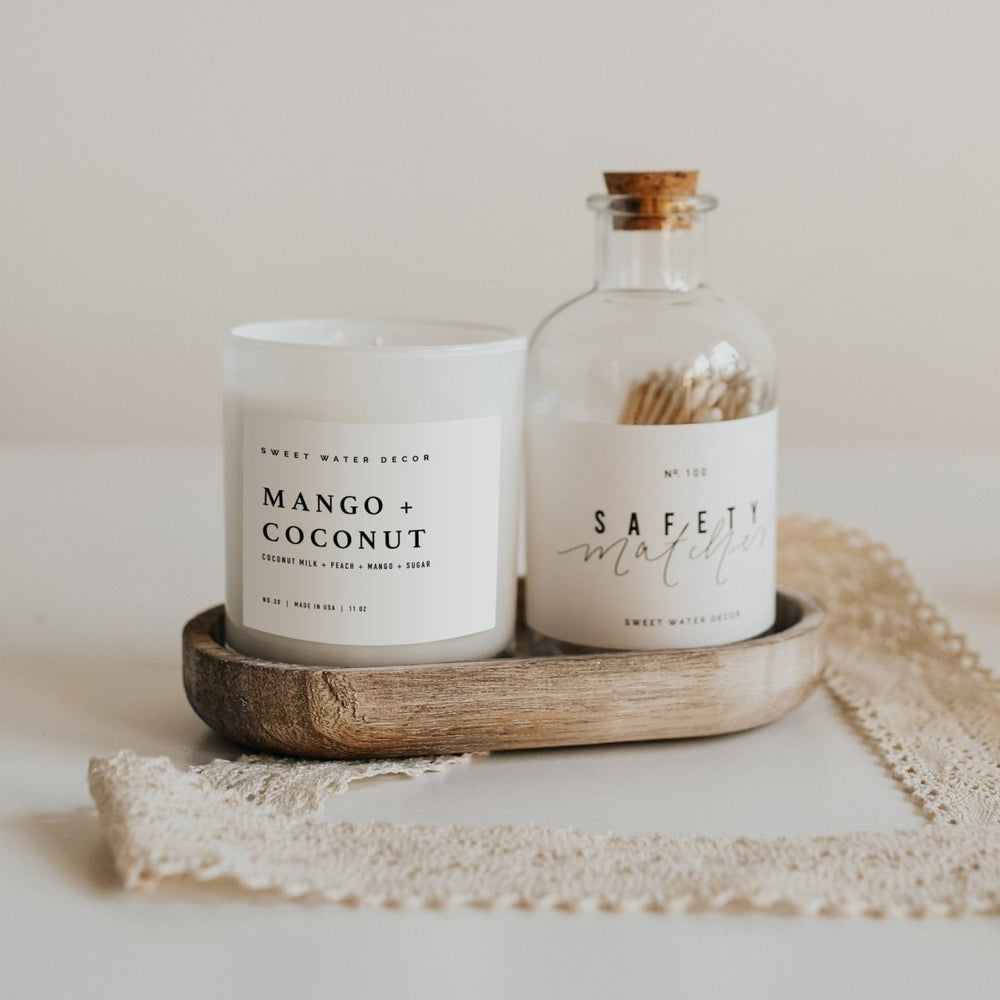 
                      
                        Sweet Water Decor Mango and Coconut Soy Candle - White Jar - 11 oz - lily & onyx
                      
                    