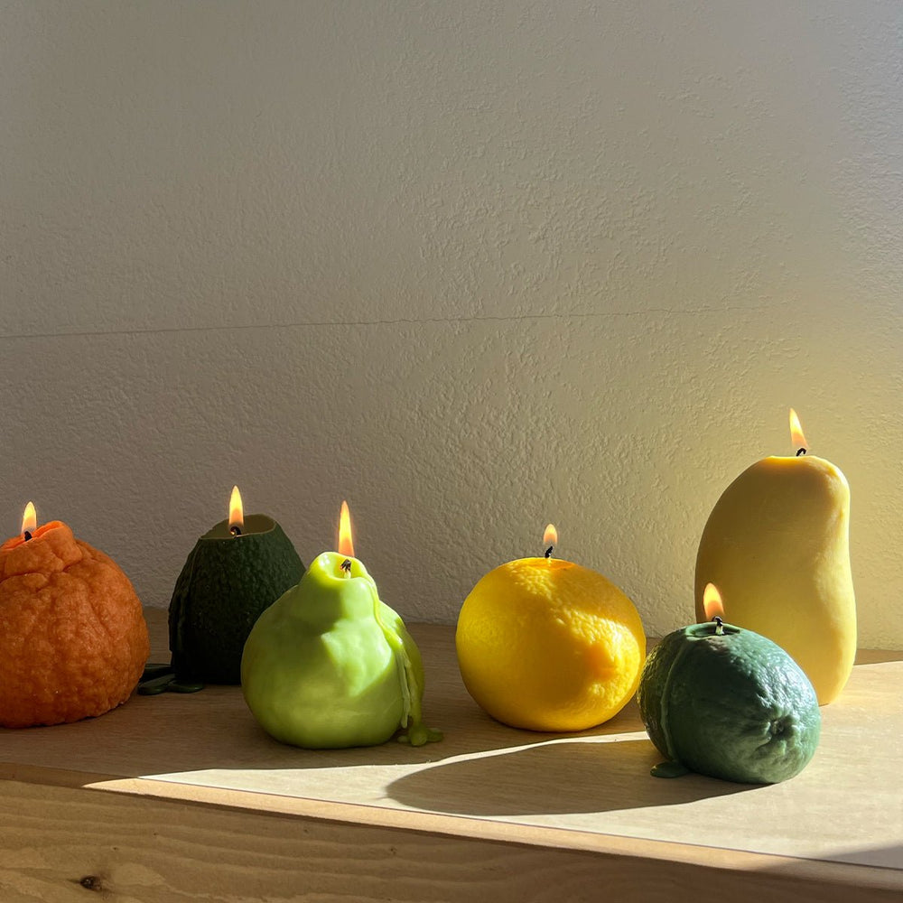 
                      
                        Scandles Mango Candle - lily & onyx
                      
                    