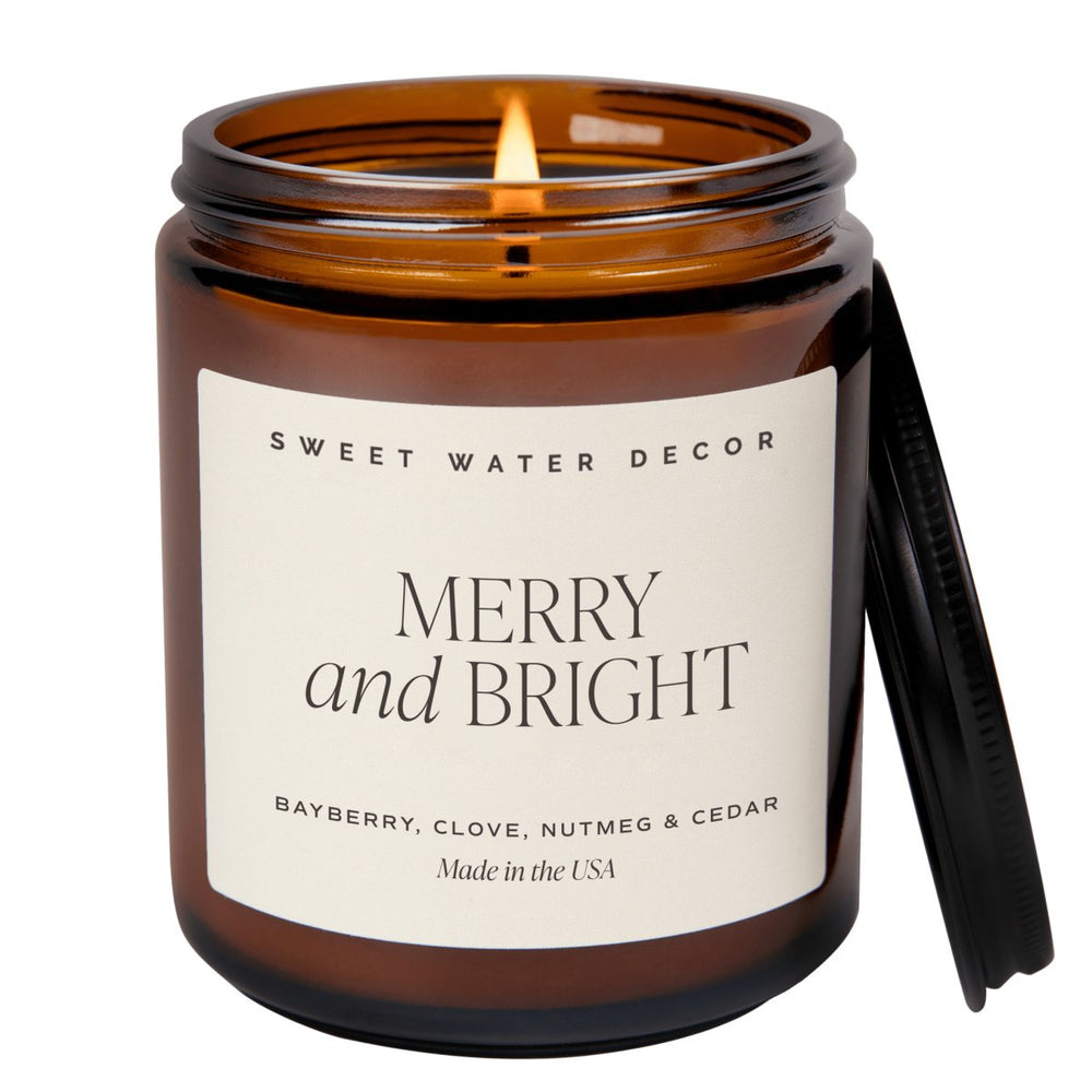 Sweet Water Decor Merry and Bright Soy Candle - Amber Jar - 9 oz - lily & onyx