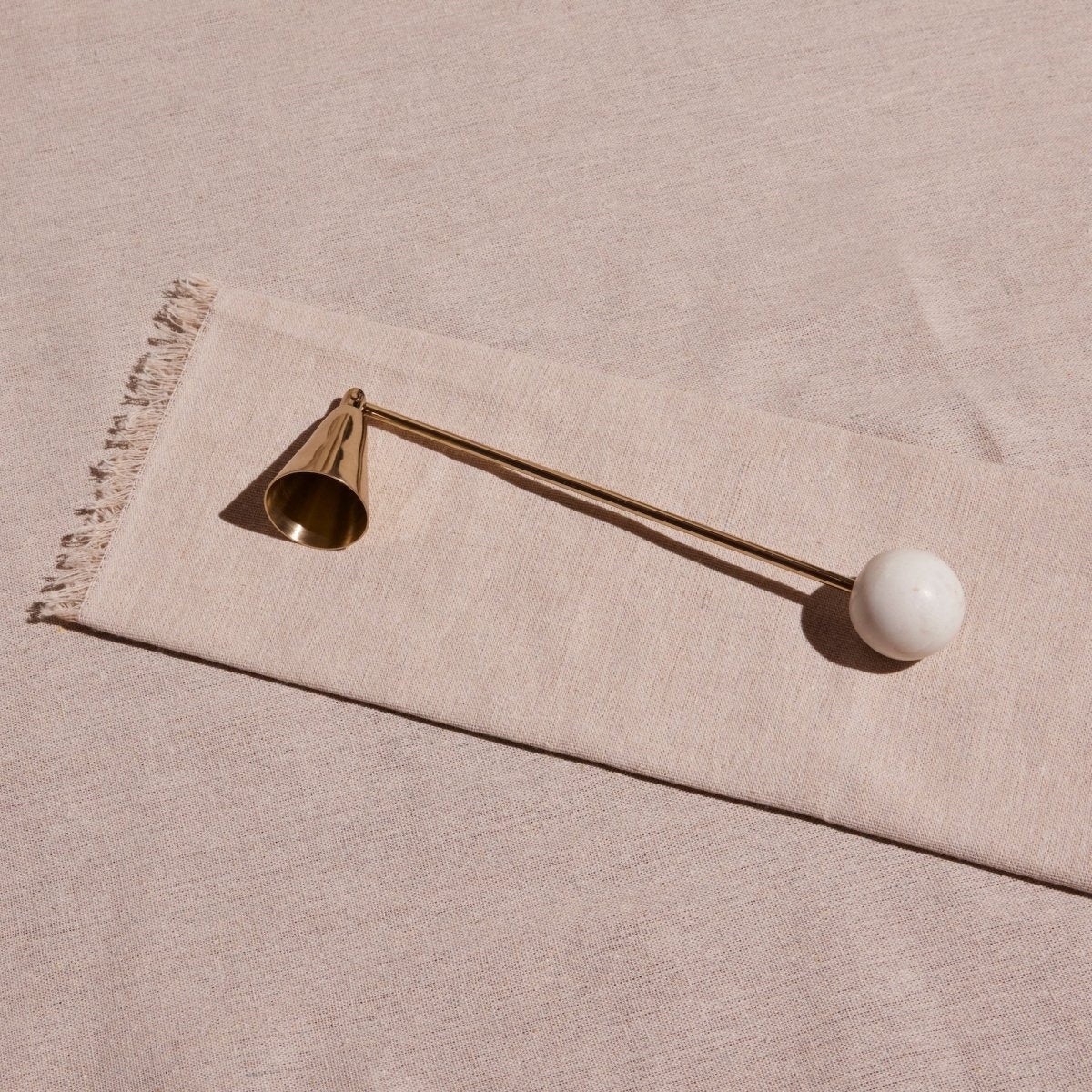 Meso Goods Anka Brass & White Marble Candle Snuffer | Handcrafted Stainless Steel Snuffer
