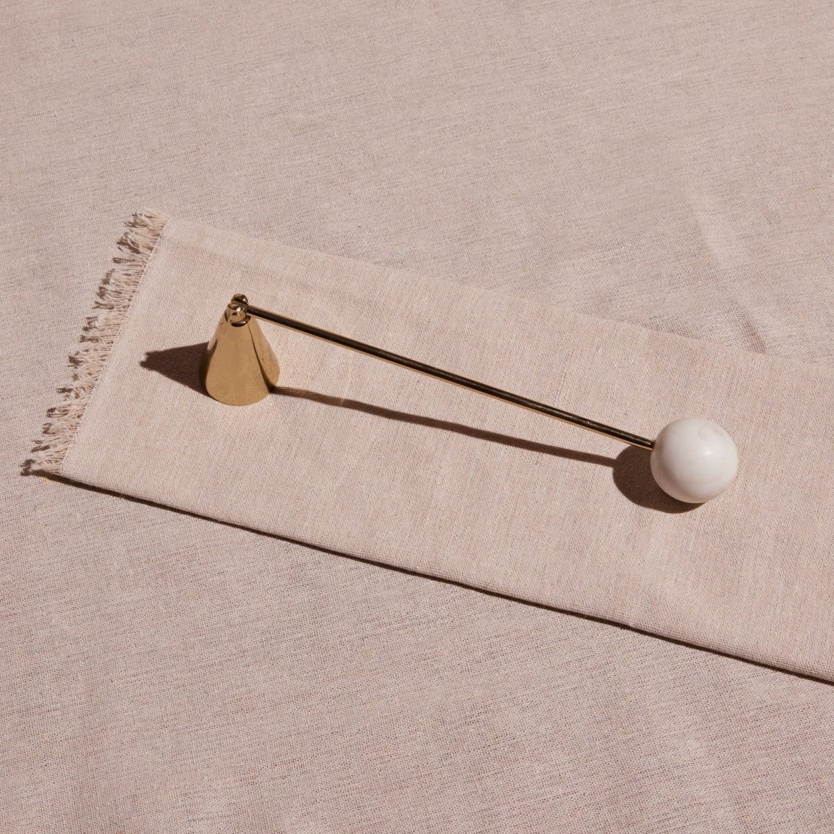 Meso Goods Anka Brass & White Marble Candle Snuffer | Handcrafted Stainless Steel Snuffer