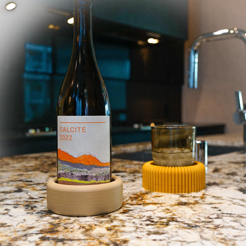 
                      
                        Mid-Century Ribbed Wine Bottle Coaster
                      
                    