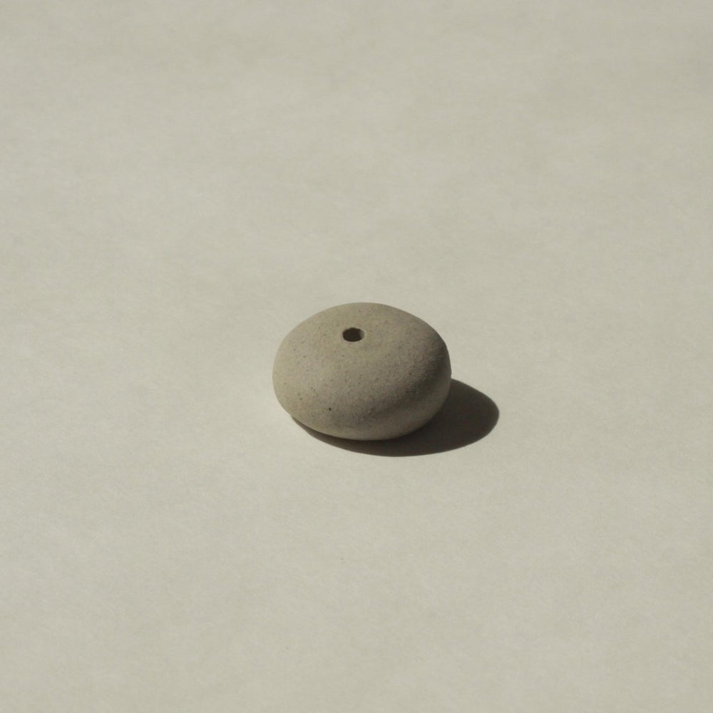 
                      
                        CEDAR AND MYRRH Mini Light Gray Ceramic Pebble Incense Holder - lily & onyx
                      
                    