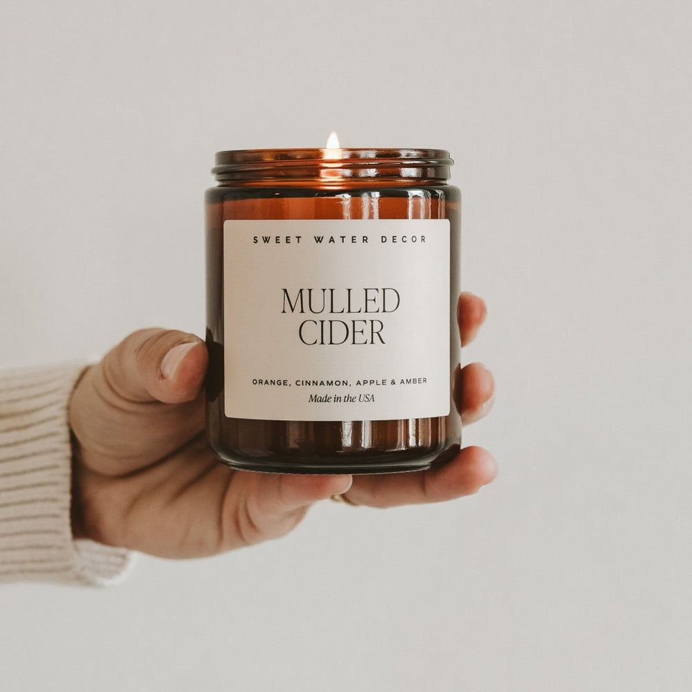
                      
                        Sweet Water Decor Mulled Cider Soy Candle - Amber Jar - 9 oz - lily & onyx
                      
                    