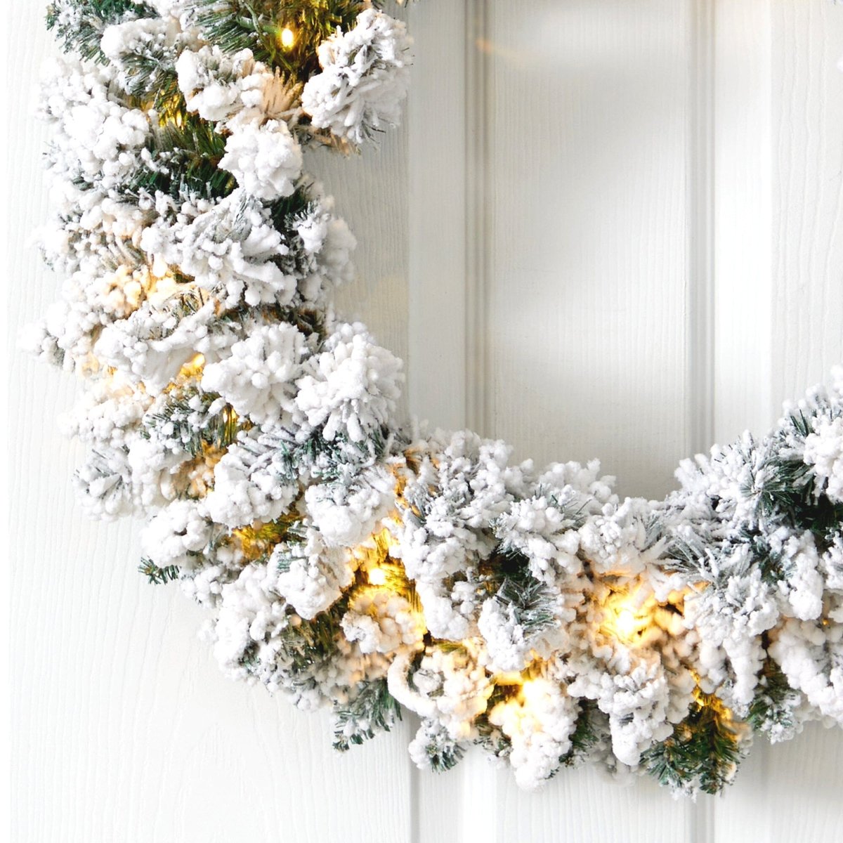 Nearly Natural 24” Flocked Artificial Christmas Wreath with 160 Bendable Branches and 35 Warm White LED Lights