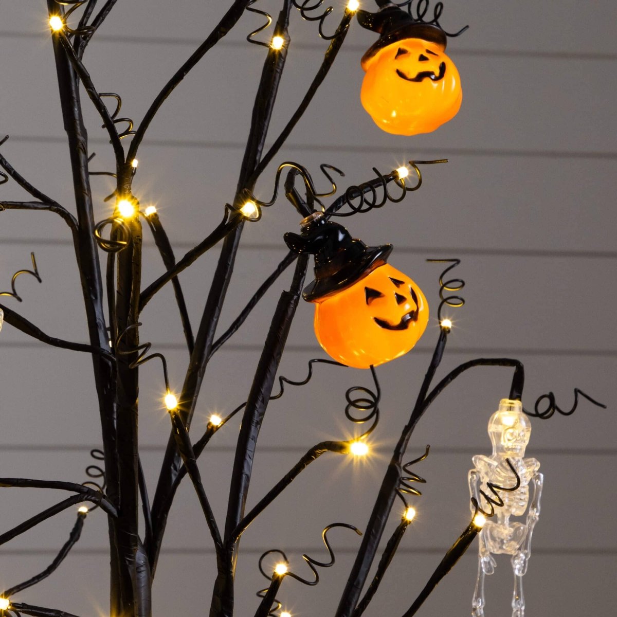 Nearly Natural 4' Pre-Lit Halloween Pumpkin & Skull Tree with 64 LEDs