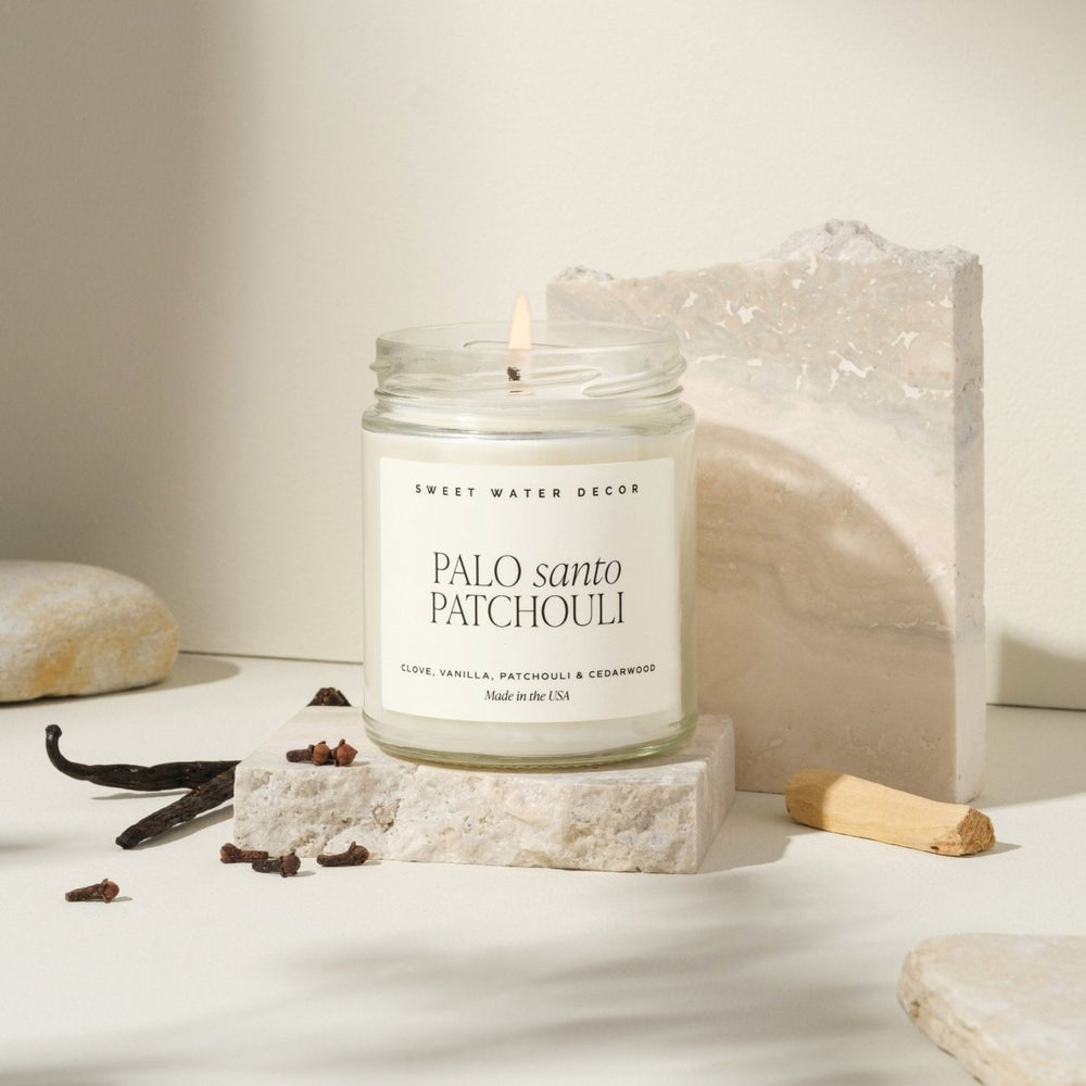 
                      
                        Sweet Water Decor Palo Santo Patchouli Soy Candle - Clear Jar - 9 oz - lily & onyx
                      
                    