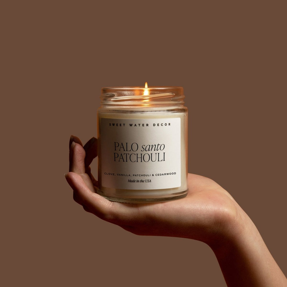 
                      
                        Sweet Water Decor Palo Santo Patchouli Soy Candle - Clear Jar - 9 oz - lily & onyx
                      
                    