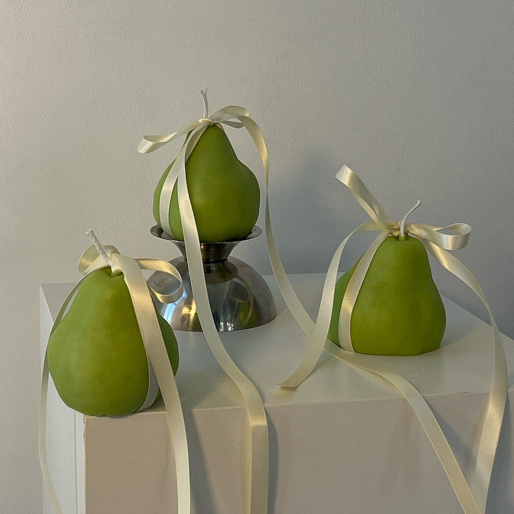 
                      
                        Scandles Pear Candle - lily & onyx
                      
                    